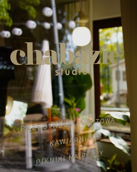 A storefront with the name 'chabazie studio' and some Polish text. 4