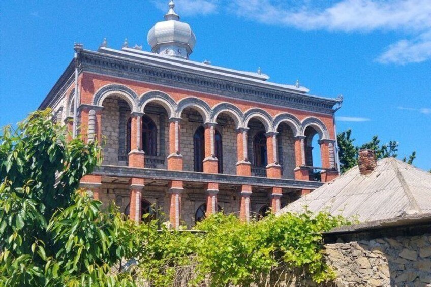 A historic building with a dome and arched windows. 5