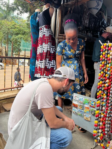A street vendor selling colorful beads and toys. 3