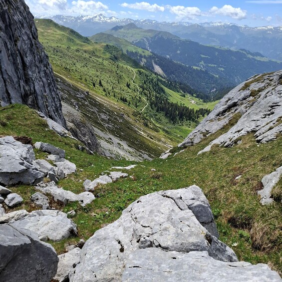 A mountainous landscape with rocky terrain and a valley. 5