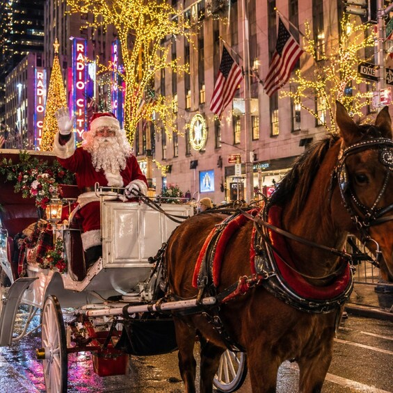 Santa Claus in a sleigh pulled by a horse, decorated with lights and flags, in a city street. 2