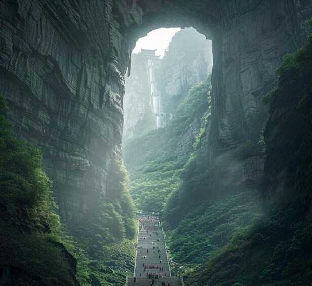 A pathway through a canyon with a large rock formation in the background. 5
