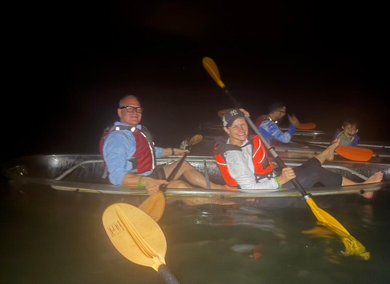 People in a boat at night. 4