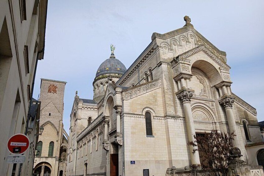 A historic building with a dome and arched windows. 4
