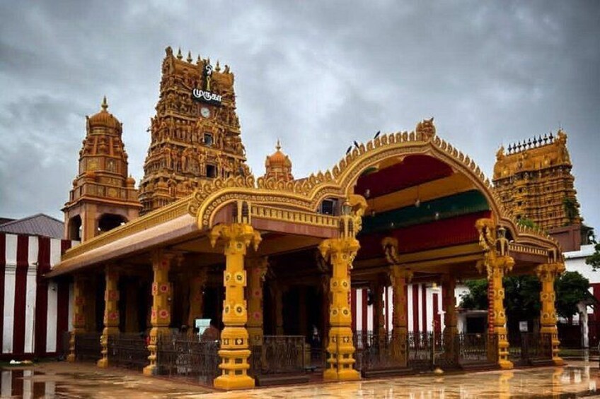 A temple with intricate architecture, including multiple towers and a large entrance archway. 1