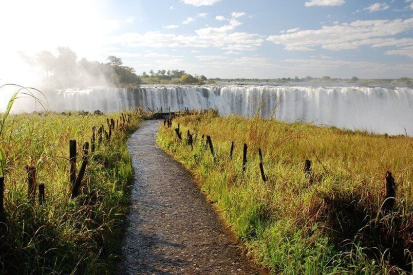 A pathway leading to a waterfall. 3