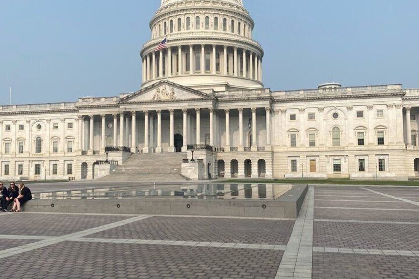 The United States Capitol building with a clear sky. 5
