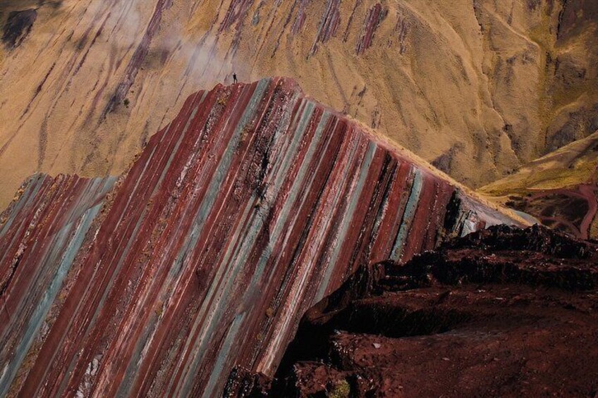 A geological formation with layered rock strata. 1