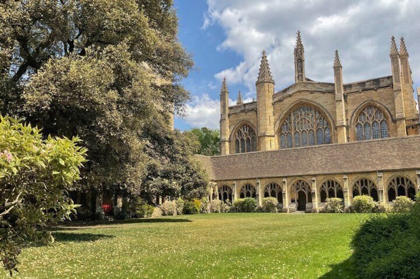 A historic building with arched windows and a courtyard. 5
