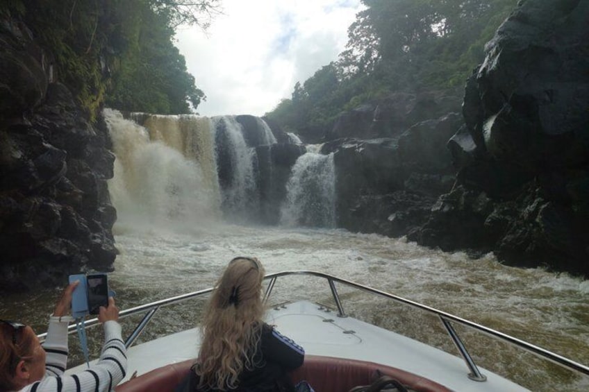 A boat navigating a waterfall. 5