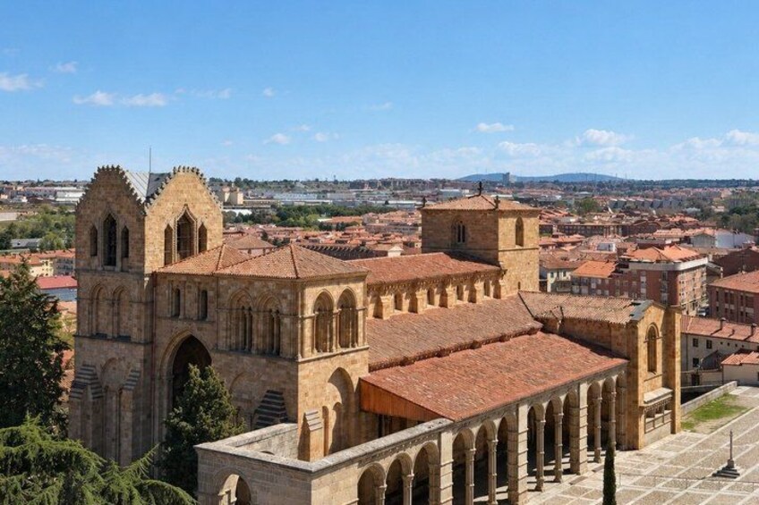 A historic church with a prominent bell tower and arched windows. 2