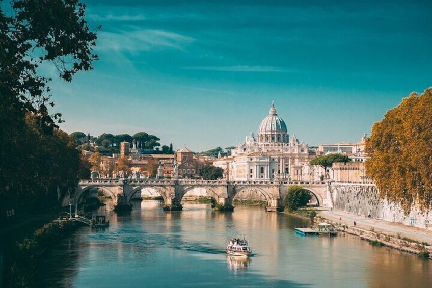 A river with a bridge, a boat, and a large domed building in the background. 2