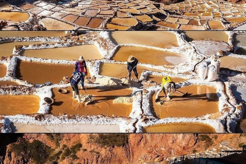 Terraced salt flats with people working. 5