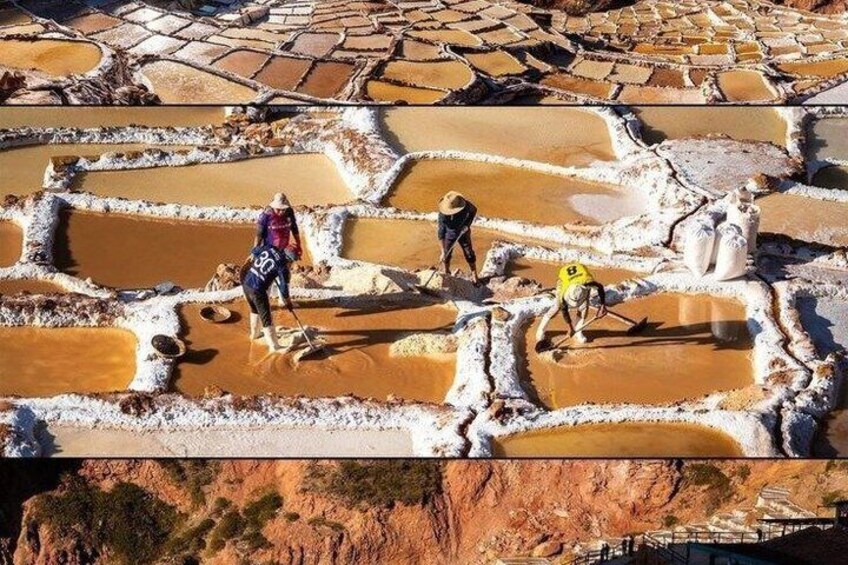 Terraced salt flats with people walking and working. 5