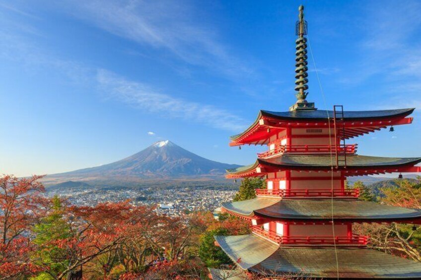 A pagoda, Mount Fuji, and autumn foliage. 3