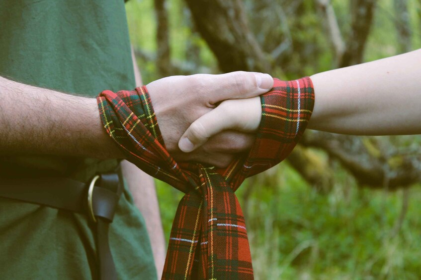 A person wearing a plaid tie. 4