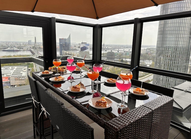 A high-rise bar with a panoramic city view. 2