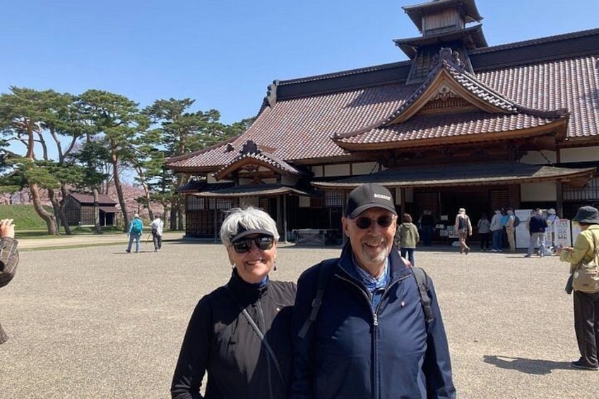 A traditional Japanese building with a tiled roof and wooden structure. 3