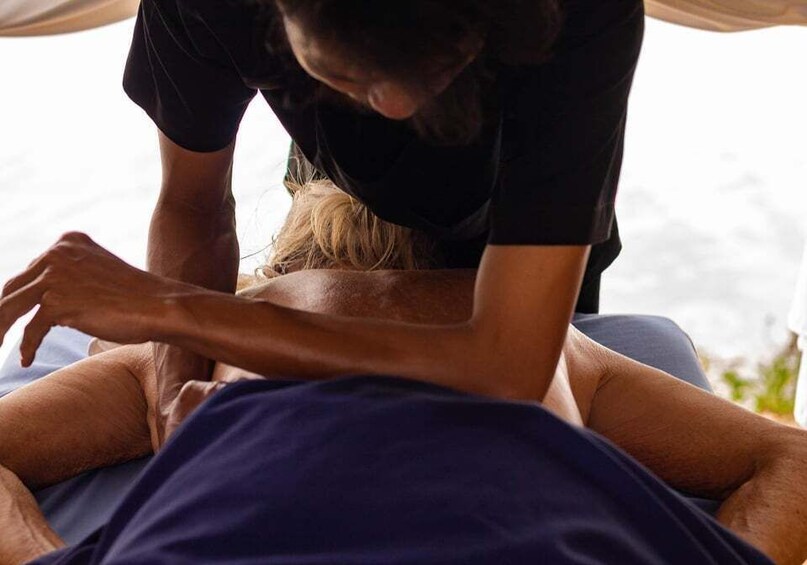 A person receiving a massage. 1