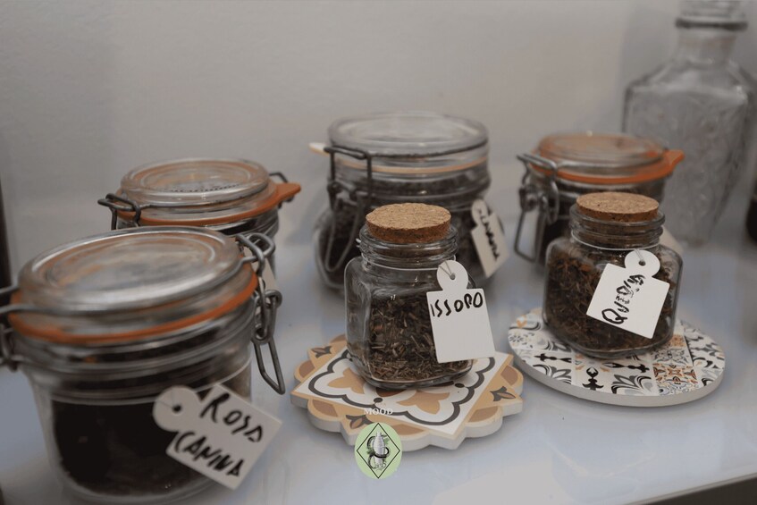 Glass jars with labels on a table. 3