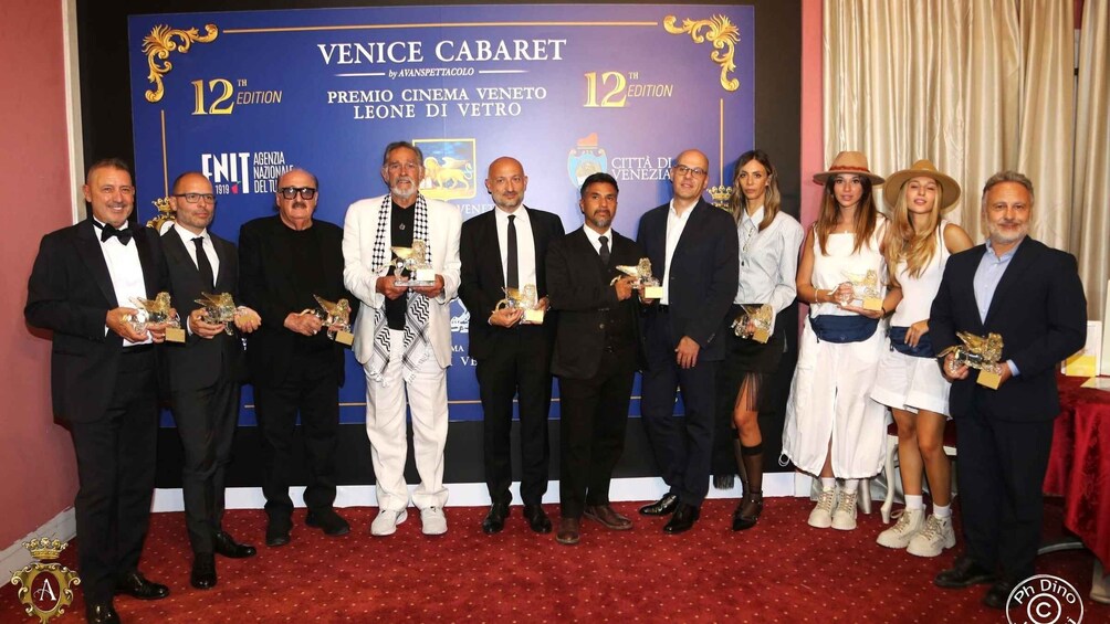A group of people holding awards at the Venice Cabaret 12th Edition event. 3
