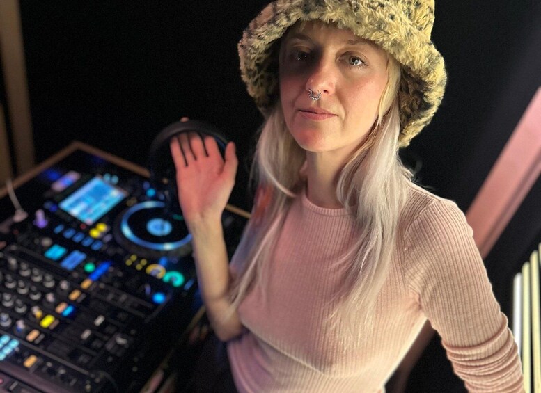 A person with a DJ controller. 4