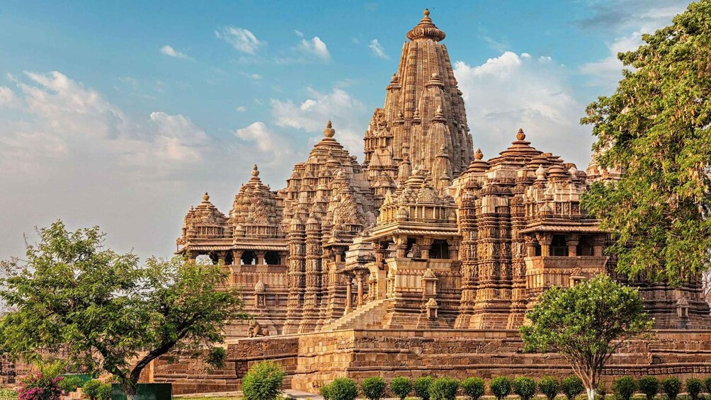 A large, intricately carved temple with multiple spires and detailed stonework. 5