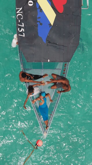Picture 1 for Activity Curaçao Sunset Glass-Bottom Boat Cruise with Drinks 3