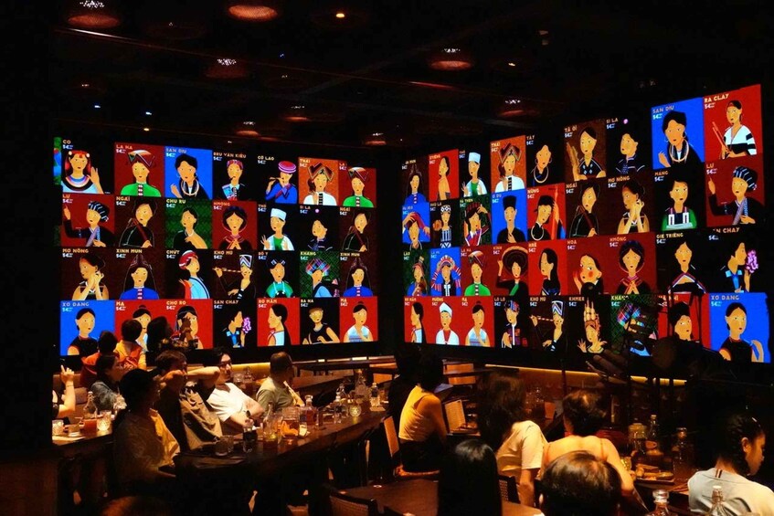 A bar with multiple screens displaying animated characters. 2
