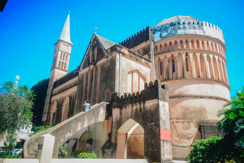 A historic church with a bell tower and a dome. 4