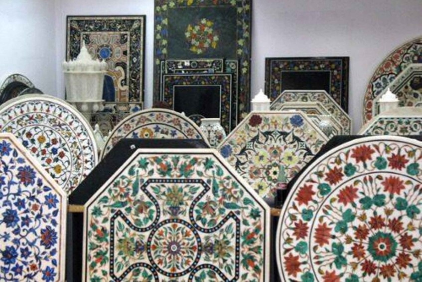 A collection of intricately designed tiles with floral patterns. 1