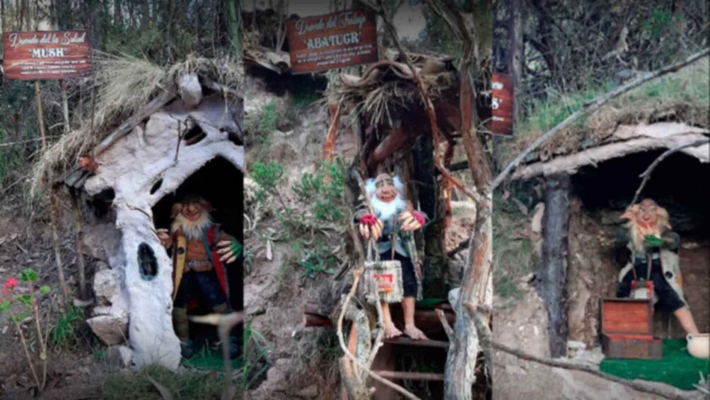 A rustic outdoor scene with miniature figures in a forest setting, including a mushroom labeled 'MUSH' and a sign reading 'ABATUGR.' 2