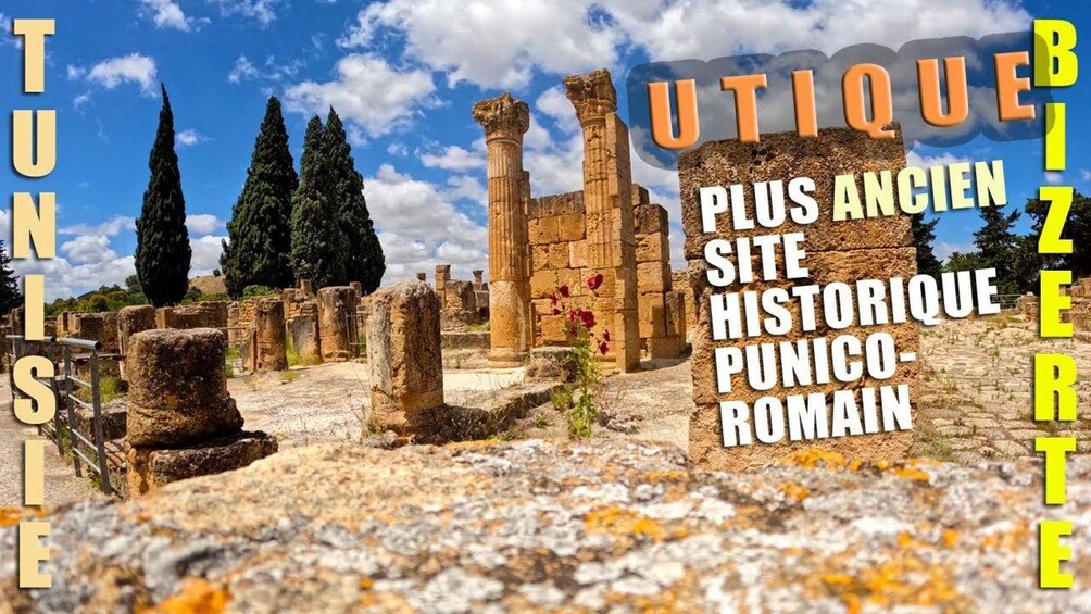 Ancient ruins with columns and stone structures, likely a historical site. 2