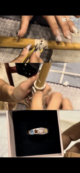 A person using a tool to work on a wooden object. 1