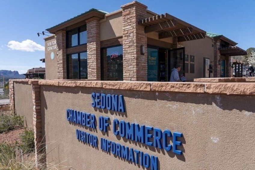 The Sedona Chamber of Commerce visitor center with a clear signboard and a building entrance. 2