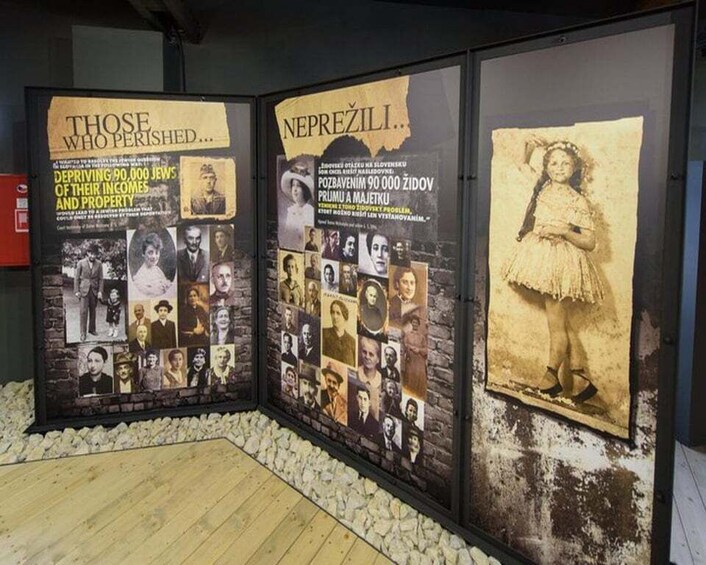 A historical exhibit with photographs and text panels. 5