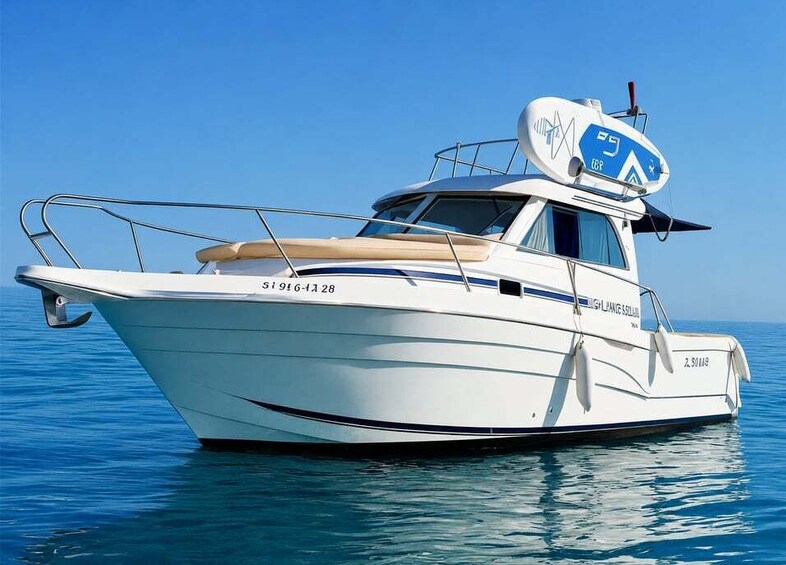 A white motorboat with registration number 51916-1A28 on calm water. 1