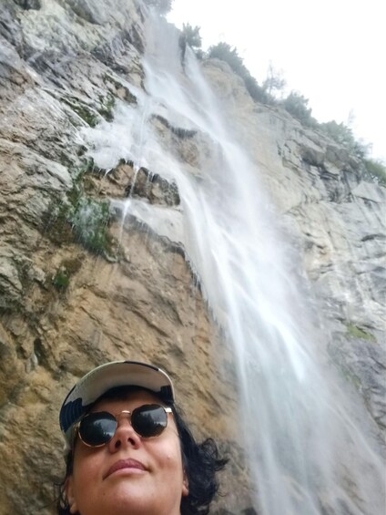 A waterfall cascading down a rocky cliff. 4