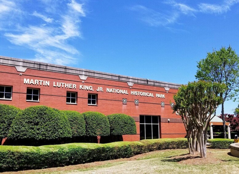 A red brick building with 'Martin Luther King, Jr. National Historical Park' signage. 4