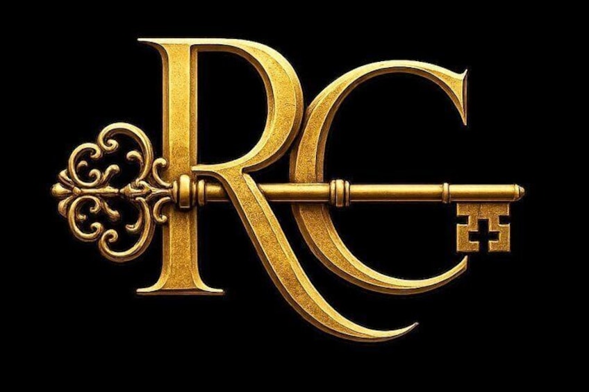 A golden key with ornate designs and the letters 'RC' on a black background. 4
