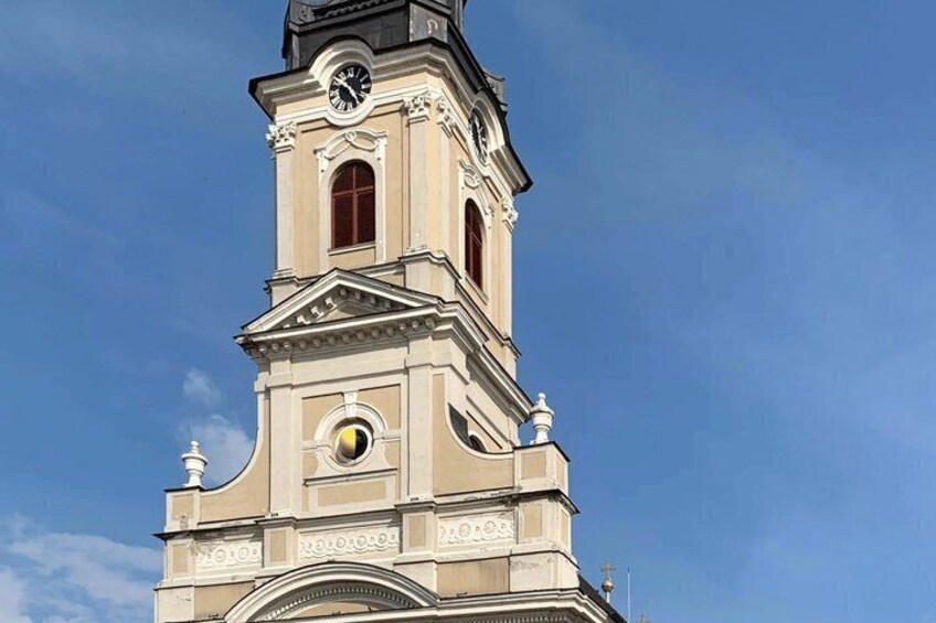 A clock tower with a clear sky in the background. 5