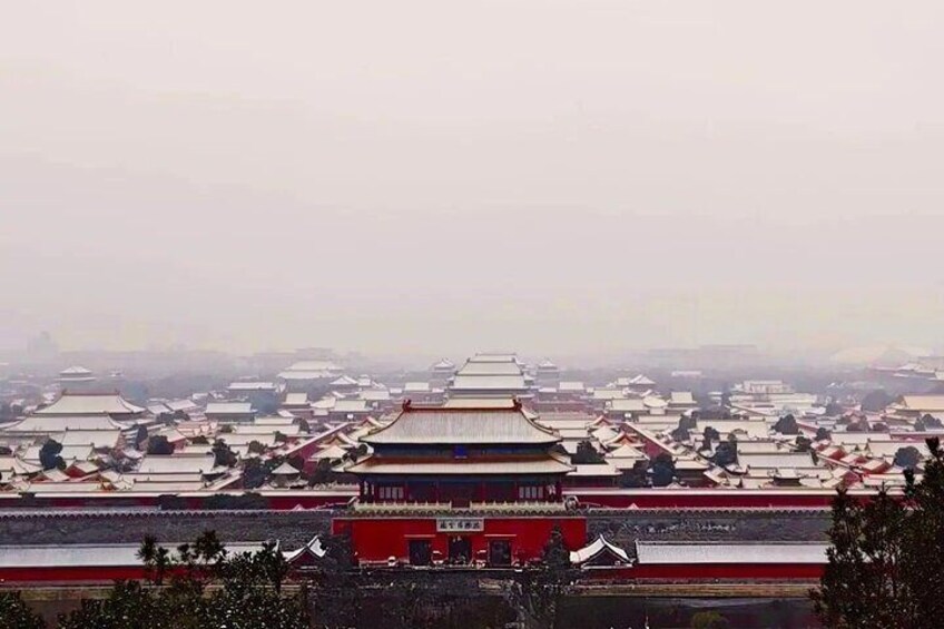 A large traditional Chinese building complex with multiple pagoda-style roofs. 3