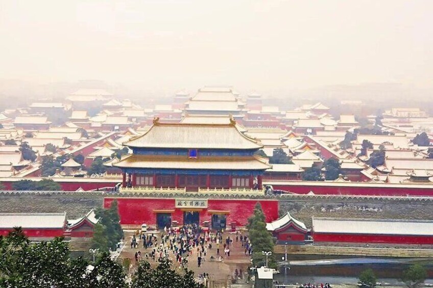 A traditional Chinese building with a golden roof, surrounded by a red wall and a crowd of people. 1