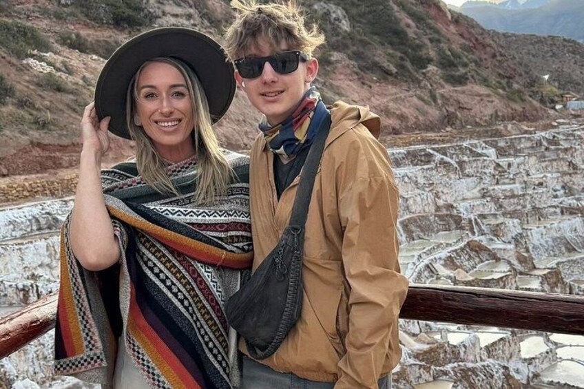 Two people standing by a terraced landscape. 2