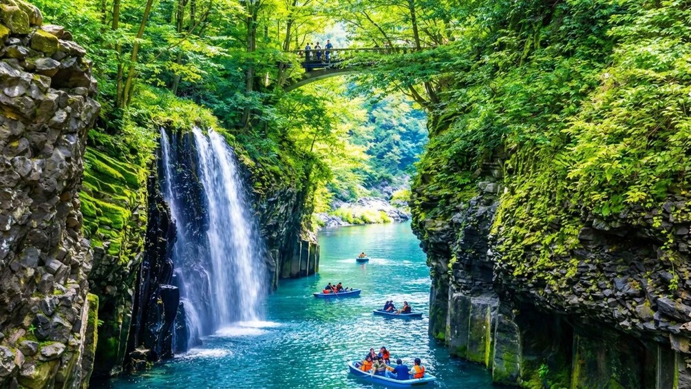 A river with a waterfall, surrounded by lush greenery and stone walls. 1