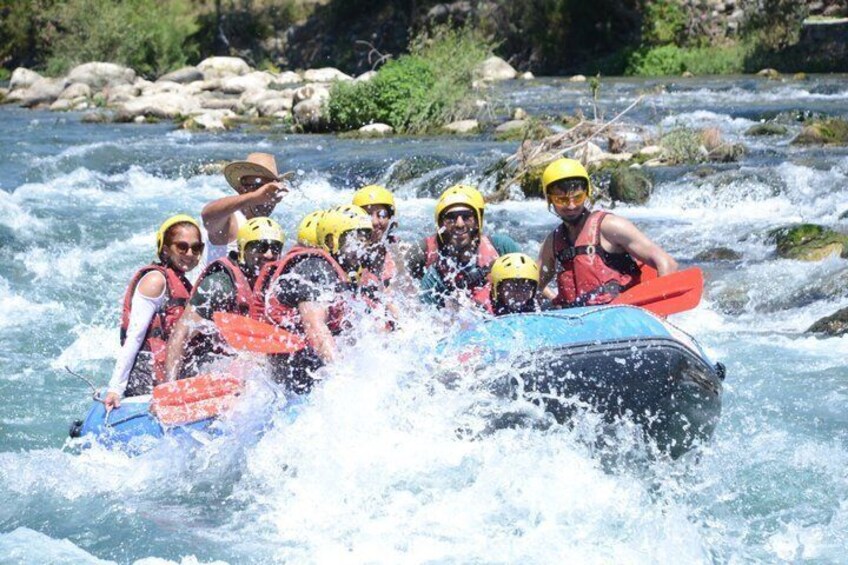 A group of people rafting on a river. 3