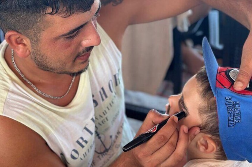 A person getting a haircut. 3