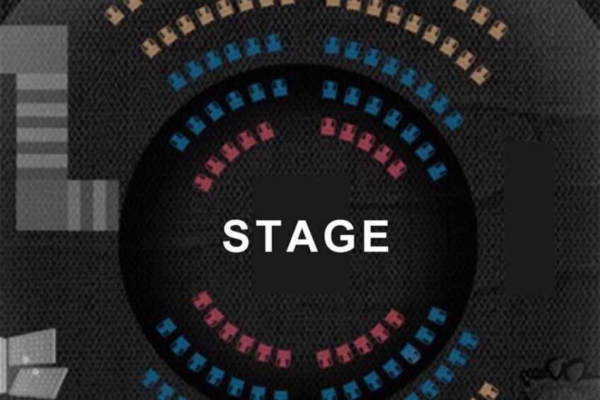 A stage with a circular arrangement of seats. 3