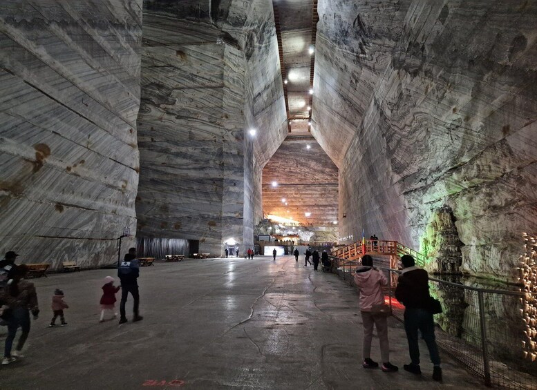 A large, cavernous space with high ceilings and natural rock formations. 5