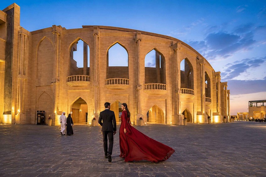 A historic building with arched windows and a courtyard. 2